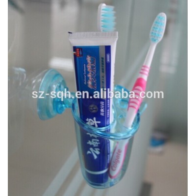 Fashion wall-sucking tooth brush holder customized toothbrush holder plastic toothbrush cup OEM acceptable